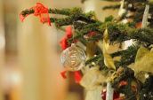 grey bauble hung on Christmas tree