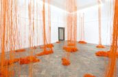 orange fringe curtain inside room