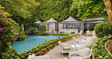 chairs and tables near pool