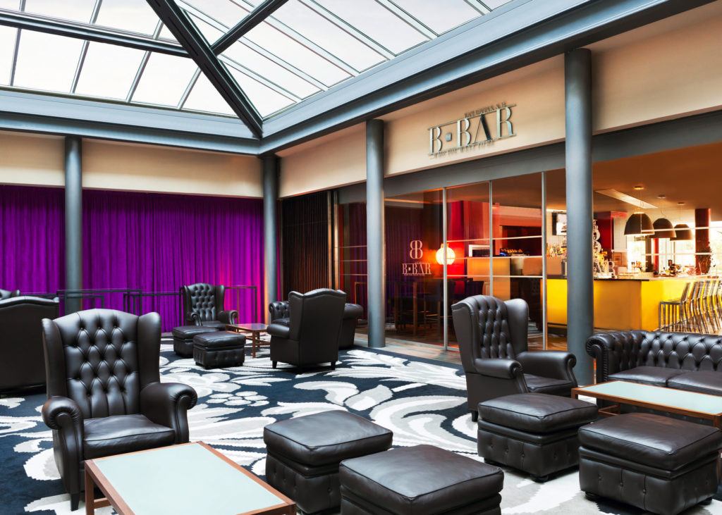 black leather armchairs in room