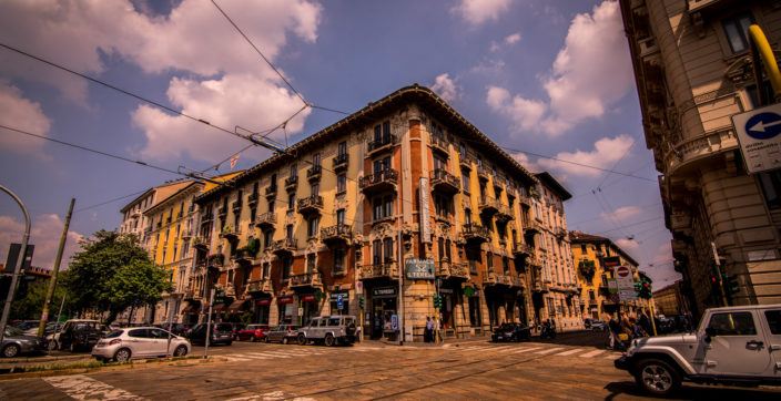 brown concrete building near road