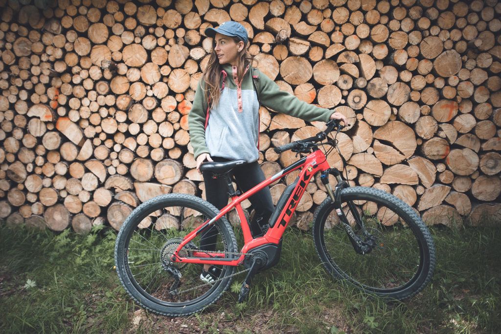 woman holding bike