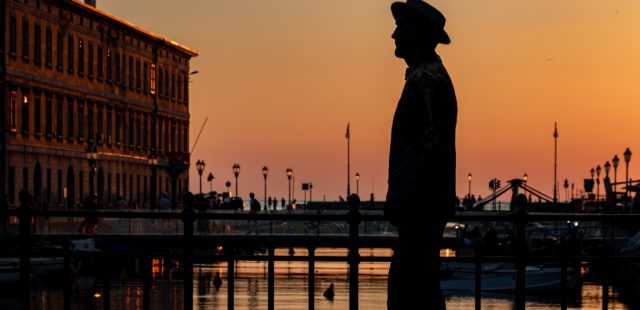 The golden hour in trieste at Canal grande with the Joyce's statue