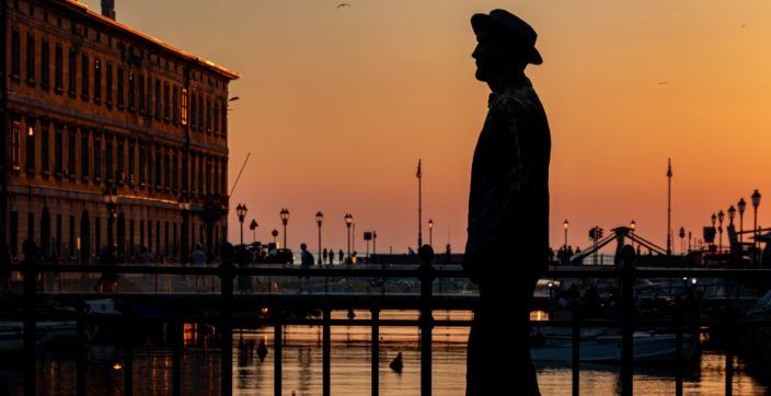 The golden hour in trieste at Canal grande with the Joyce's statue