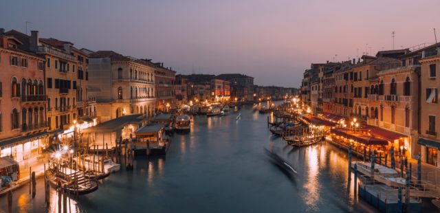 Sunset view of Rialto Bridge in Venice