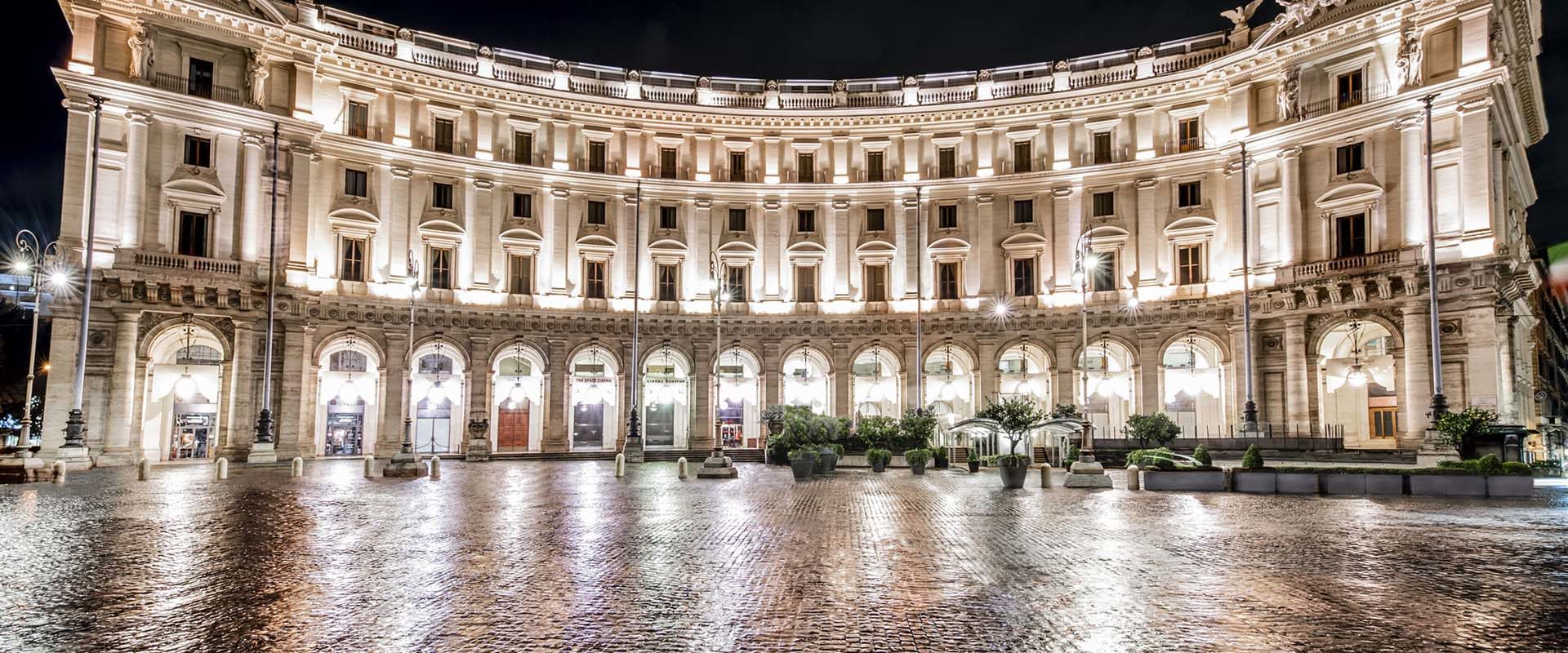Exterior of the Palazzo Naiadi hotel in Rome at night