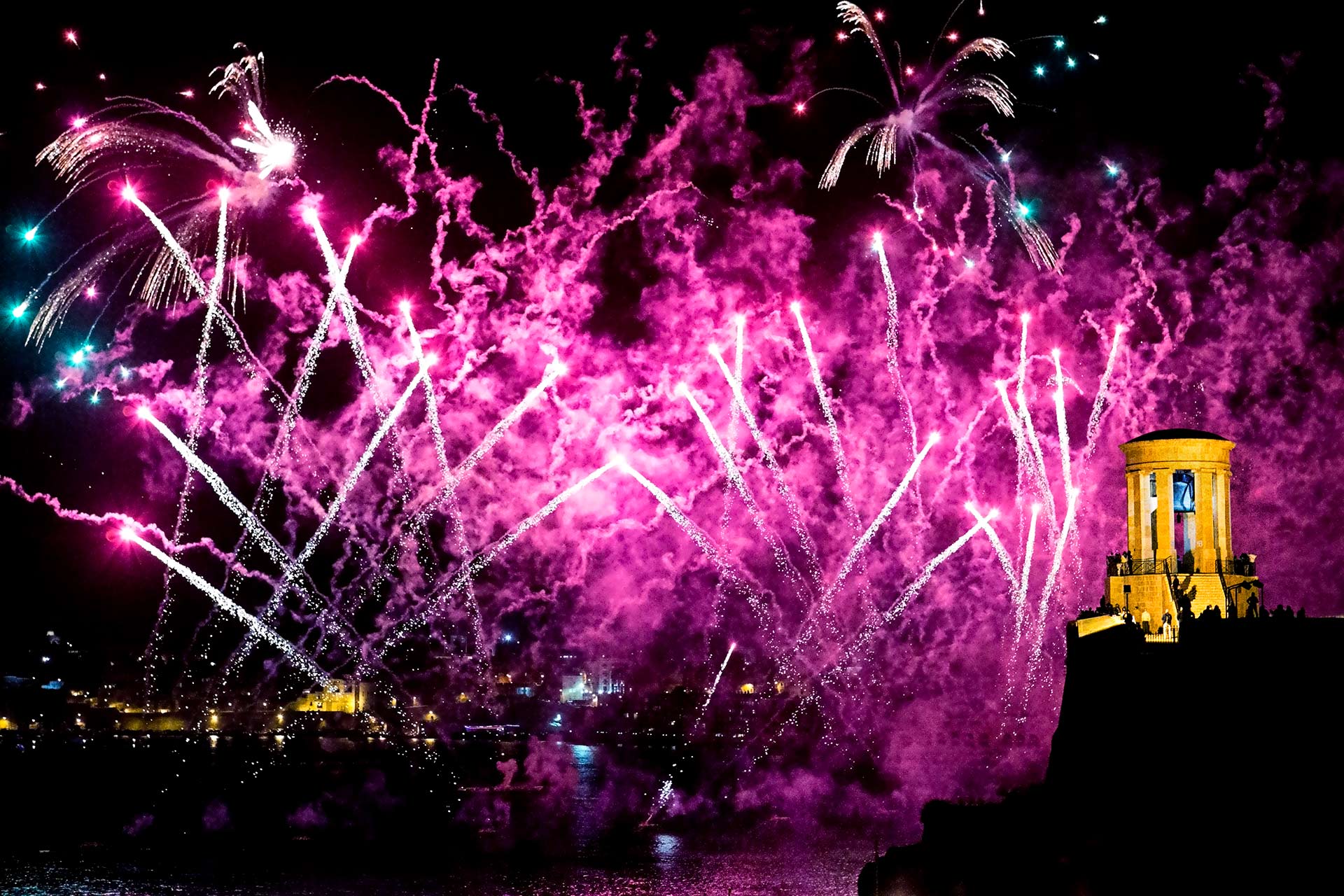 Spectacular pink fireworks during the festa season in Malta
